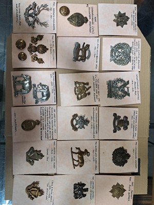 Lot 145 - Approx. 80 WW1 military cap badges, lapel badges, and buttons.