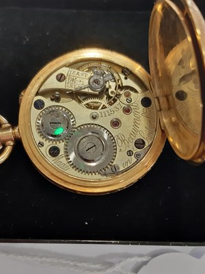 Lot 310 - Beaumont - A yellow metal open face fob watch.