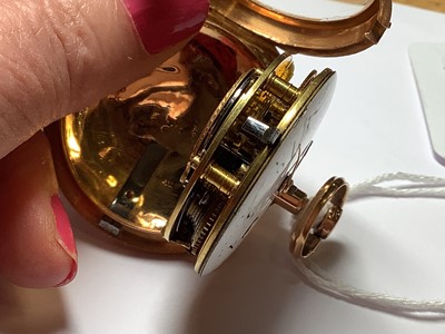 Lot 305 - A yellow metal open face pocket watch.