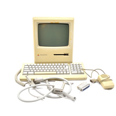 Lot 277 - Apple Macintosh Plus computer, with keyboard, mouse and cables.