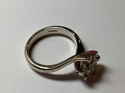 Lot 5 - A diamond solitaire ring.