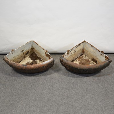 Lot 507 - Cast iron wall-mounted animal feeders