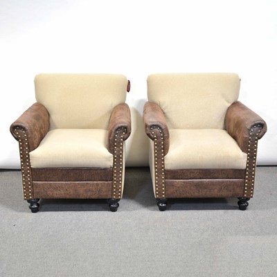 Lot 696 - Pair of modern leather and cloth easy chairs