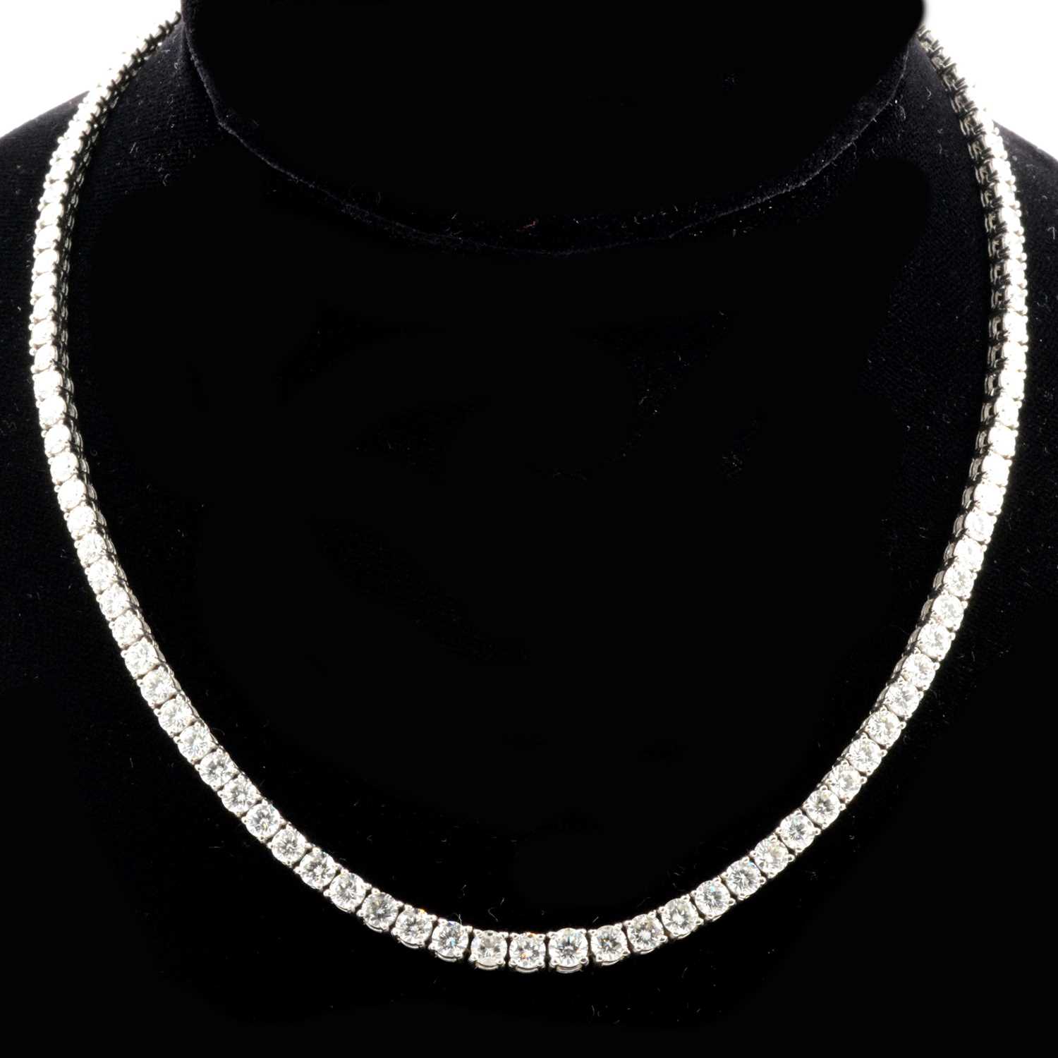 Lot 201 - A diamond Riviere necklace, approximately 20 carats.