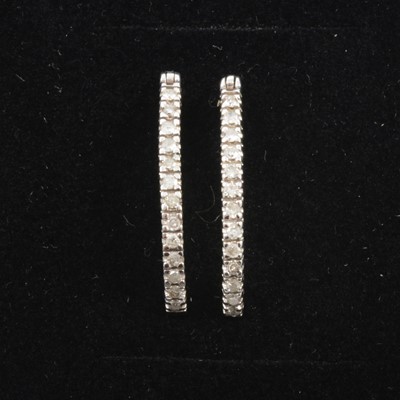 Lot 162A - A pair of diamond hoop earrings