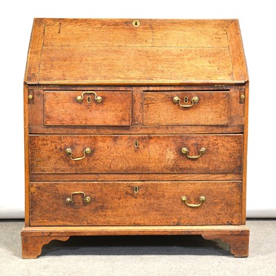 Lot 665 - George III oak bureau