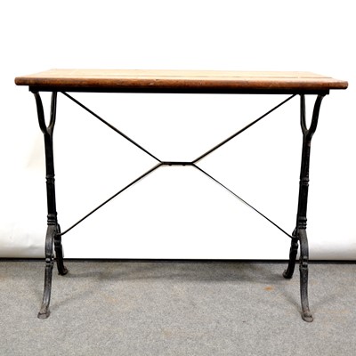 Lot 421 - Cast iron table with a mahogany top