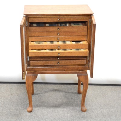 Lot 177 - Early 20th century oak microscope slide cabinet, with a large quantity of slides