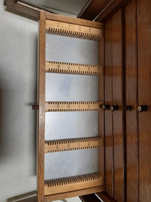 Lot 177 - Early 20th century oak microscope slide cabinet, with a large quantity of slides