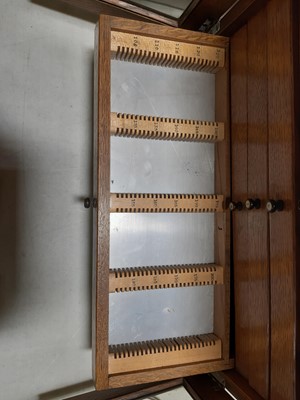 Lot 177 - Early 20th century oak microscope slide cabinet, with a large quantity of slides