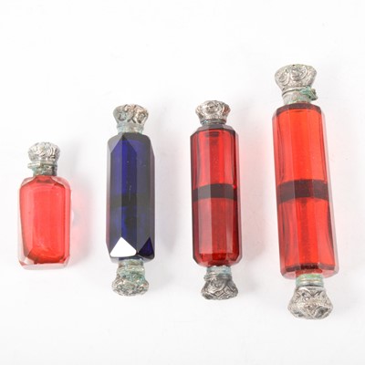 Lot 177 - Four Victorian glass scent bottles, three doubled ended