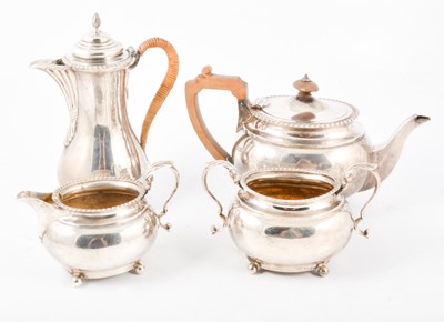 Lot 284 - Silver three piece teaset and matched hot water jug