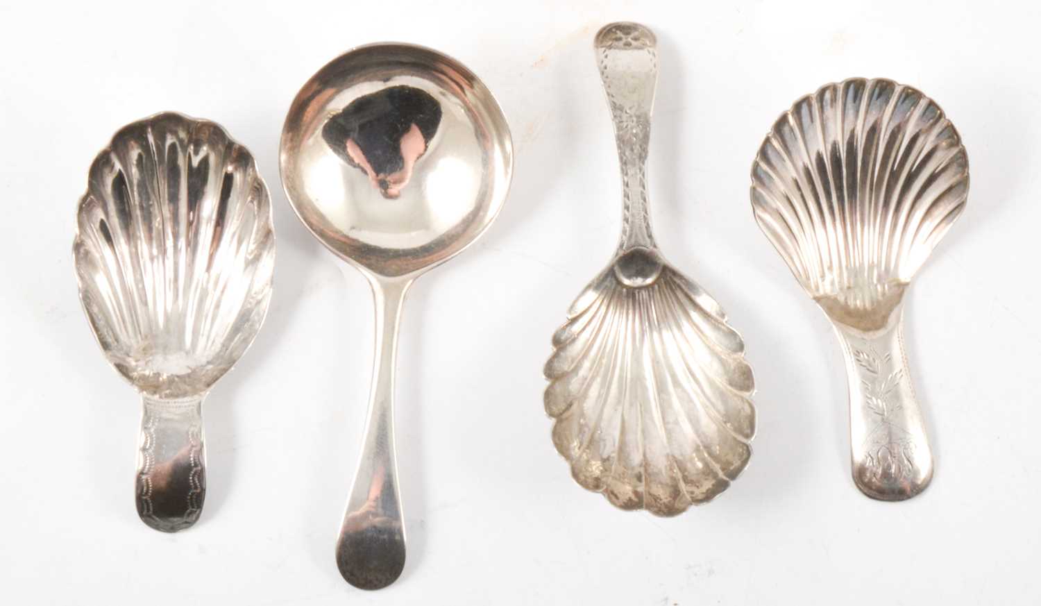 Lot 377 Four silver caddy spoons,