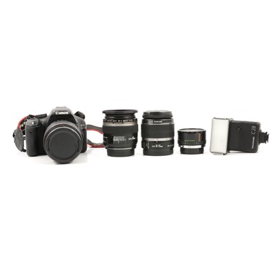 Lot 141 - Canon EOS550D plus a selection of lenses, in two softshell cases