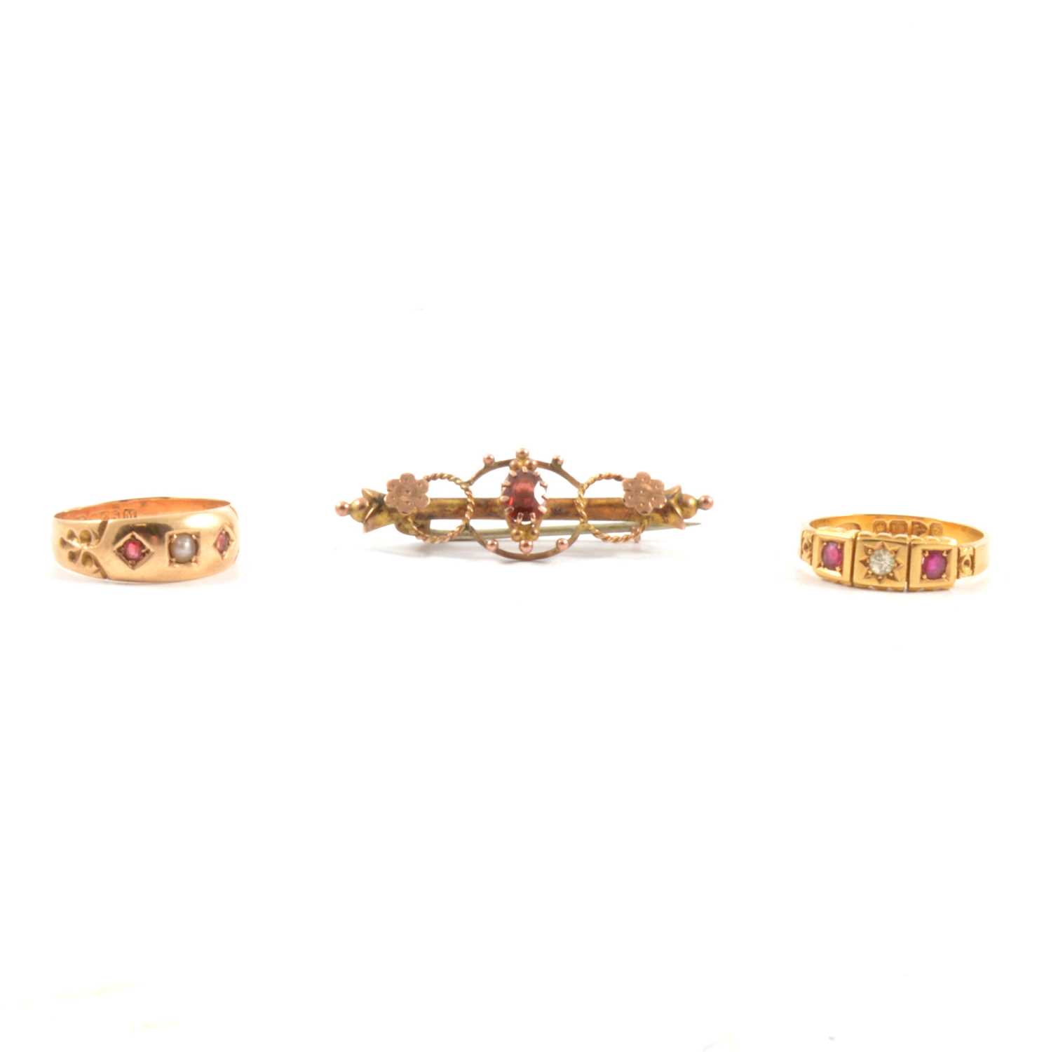 Lot 68 - Two Victorian ruby rings and a bar brooch.