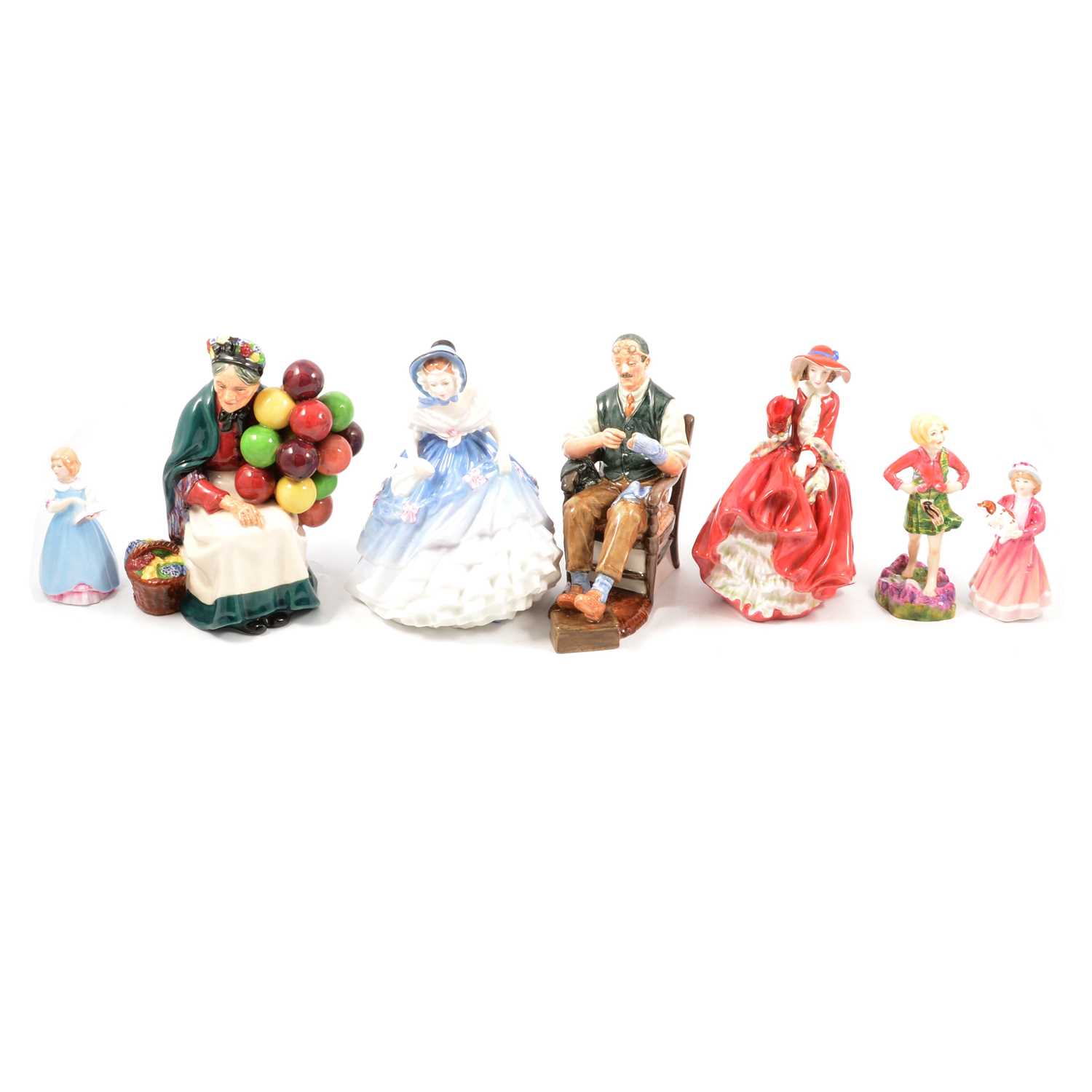 Lot 35 - Seven Royal Doulton figures and a Royal Worcester figure