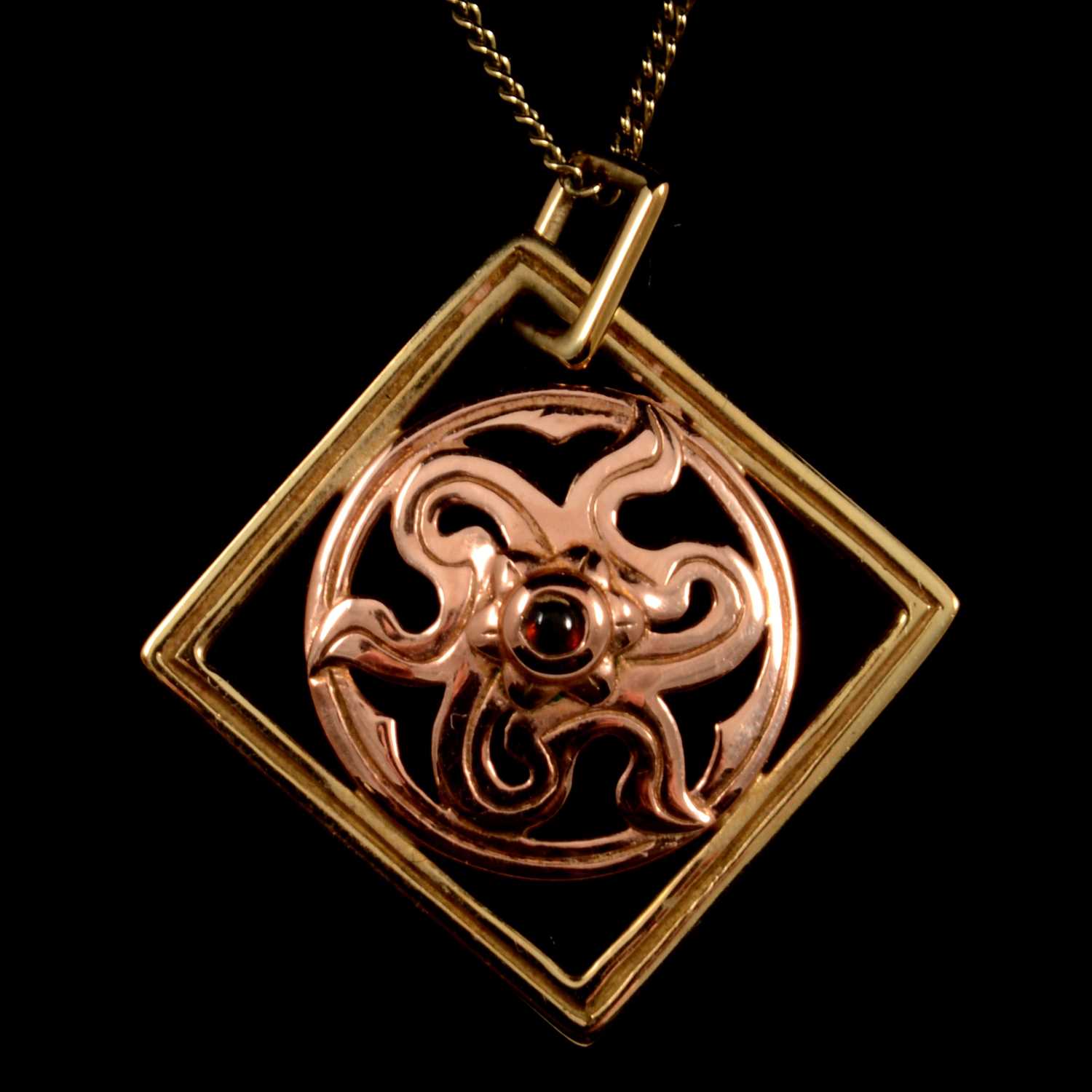 Lot 95 - A Clogau Welsh gold pendant and chain.