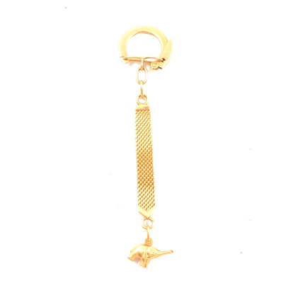 Lot 282C - A yellow metal key ring with elephant charm.