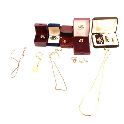 Lot 281A - Three gemset rings and a gemset pendant.