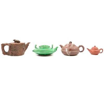 Lot 91 - Four Chinese earthenware teapots and four vases