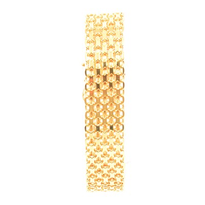 Lot 75 - A 9 carat yellow gold flat bracelet.