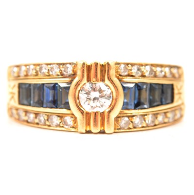 Lot 20 - A sapphire and diamond ring.