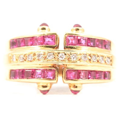 Lot 25 - A ruby and diamond ring.