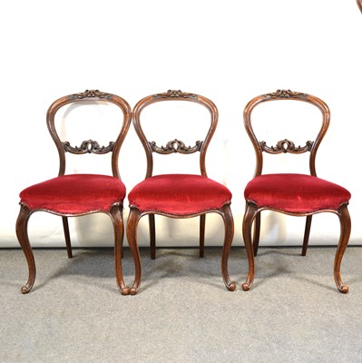 Lot 395 - Set of six Victorian carved walnut balloon-back chairs