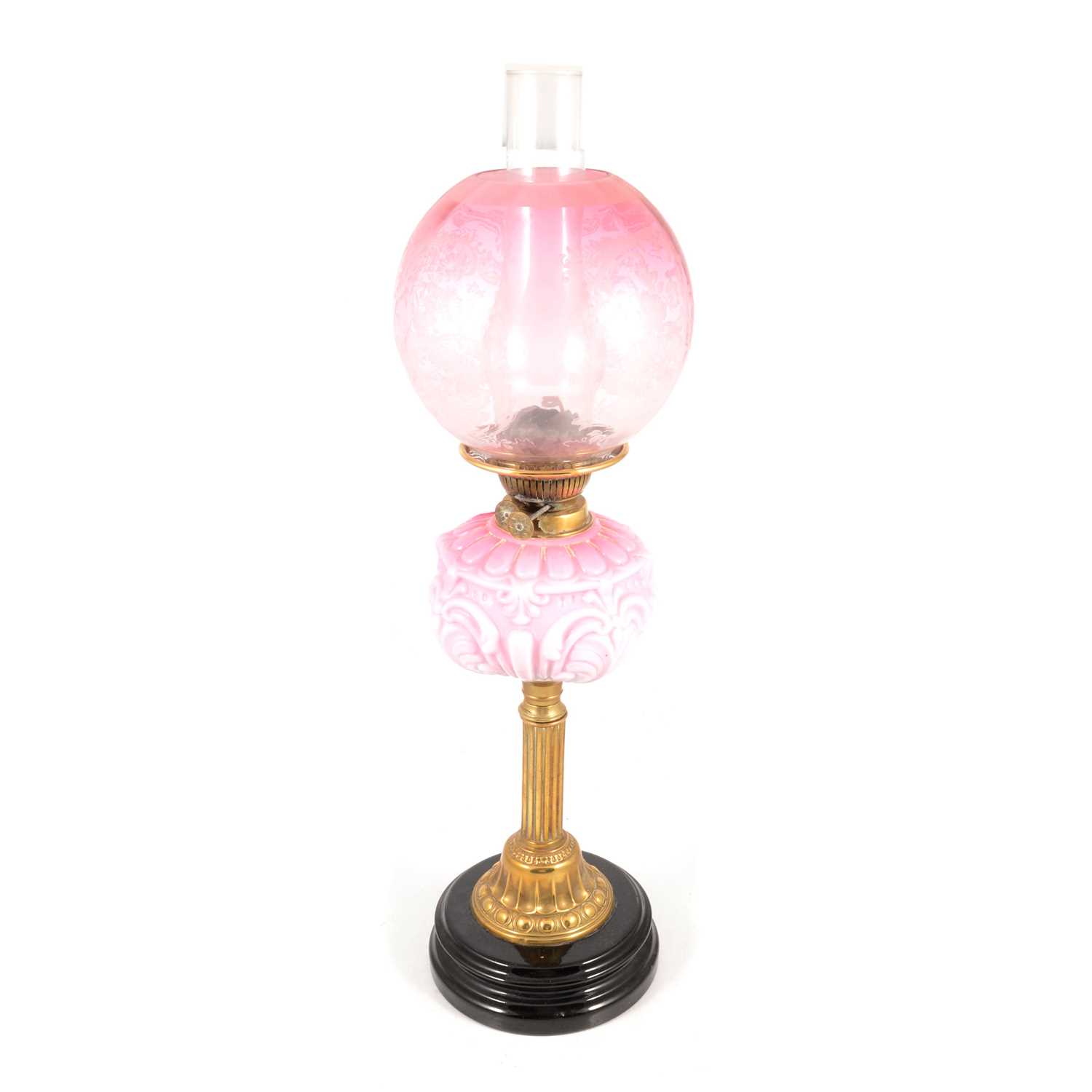 Lot 450 - Victorian brass oil lamp, strawberry tinted