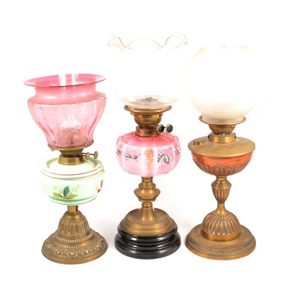 Lot 445 - Collection of three brass oil lamps