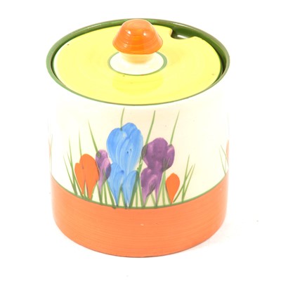 Lot 209 - Clarice Cliff, a 'Crocus' design preserve pot and cover