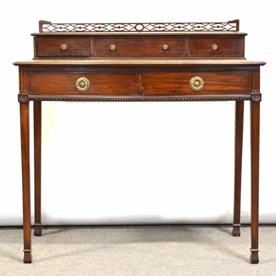 Lot 718 - Edwardian mahogany writing table