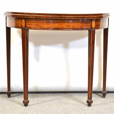 Lot 716 - George III mahogany foldover tea table