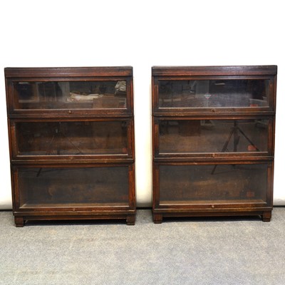 Lot 323 - Two Globe Wernicke oak sectional bookcases