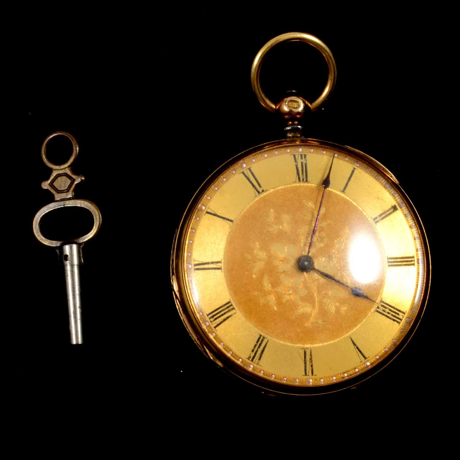 Lot 147 - A yellow metal open face pocket watch.
