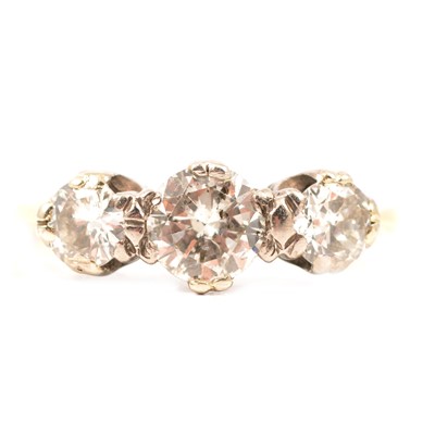 Lot 81 - A diamond three stone ring.