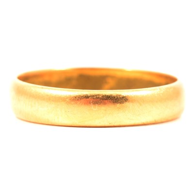 Lot 37 - A 22 carat yellow gold wedding band.