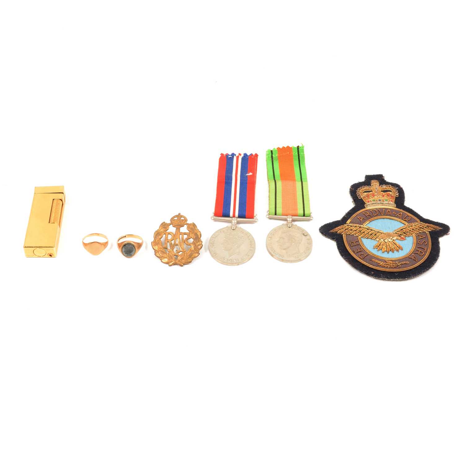 Lot 61 - Two gold signet rings, WW2 medals, RAF badge and patch, and Dunhill lighter.
