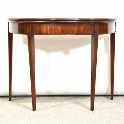 Lot 433 - George III mahogany foldover tea table