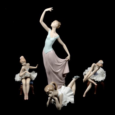 Lot 24 - Four Lladro and Nao ballet figurines.