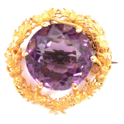 Lot 120 - An amethyst brooch with 15ct pad stamp.