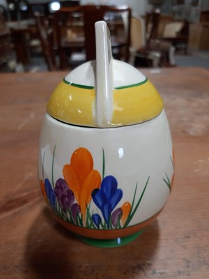 Lot 12 - Clarice Cliff, a 'Crocus' pattern daffodil preserve pot and cover