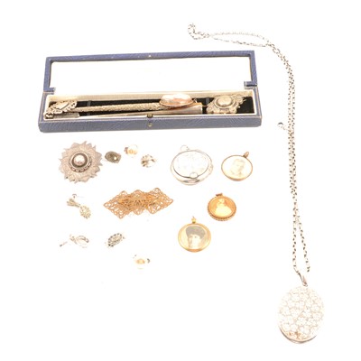 Lot 249 - A white metal oval locket and chain, cigarette holder, brooches etc.