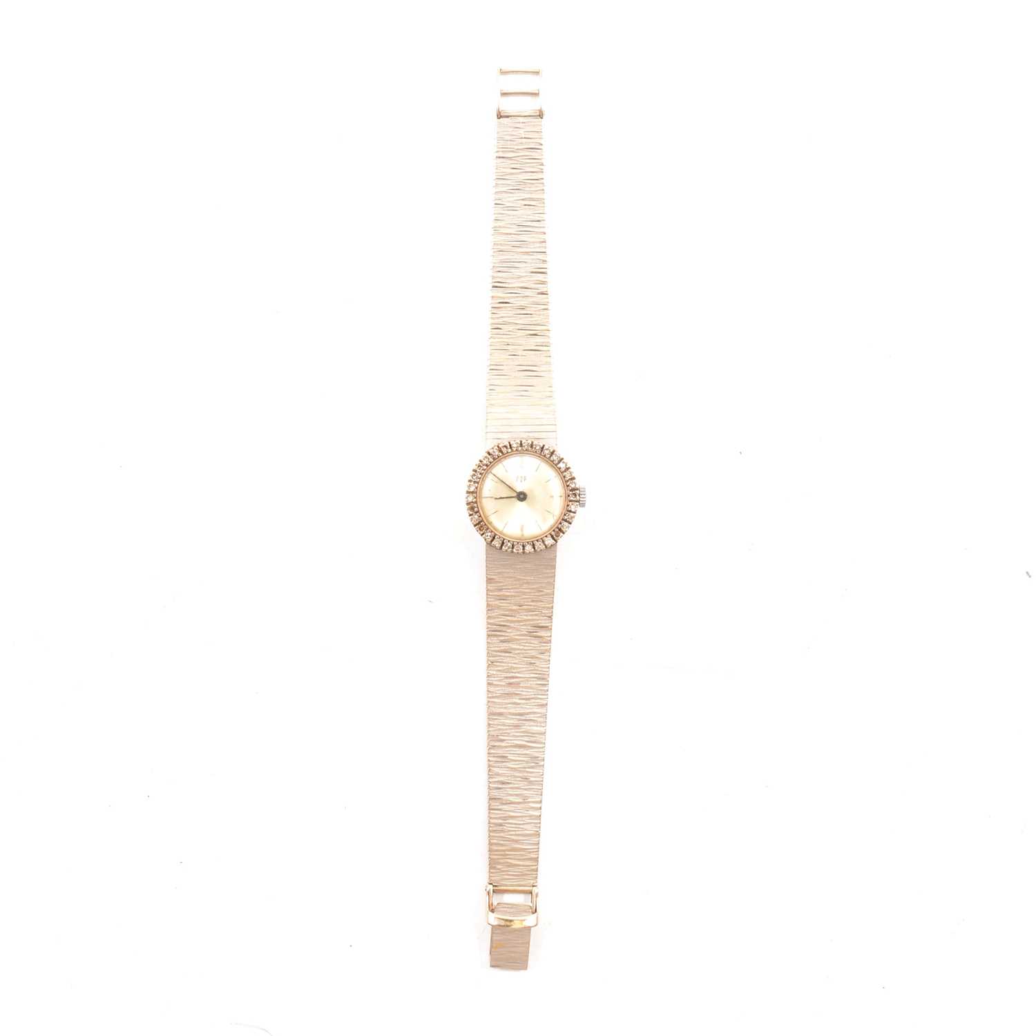 Lot 207 - A French white metal and diamond lady's wristwatch.