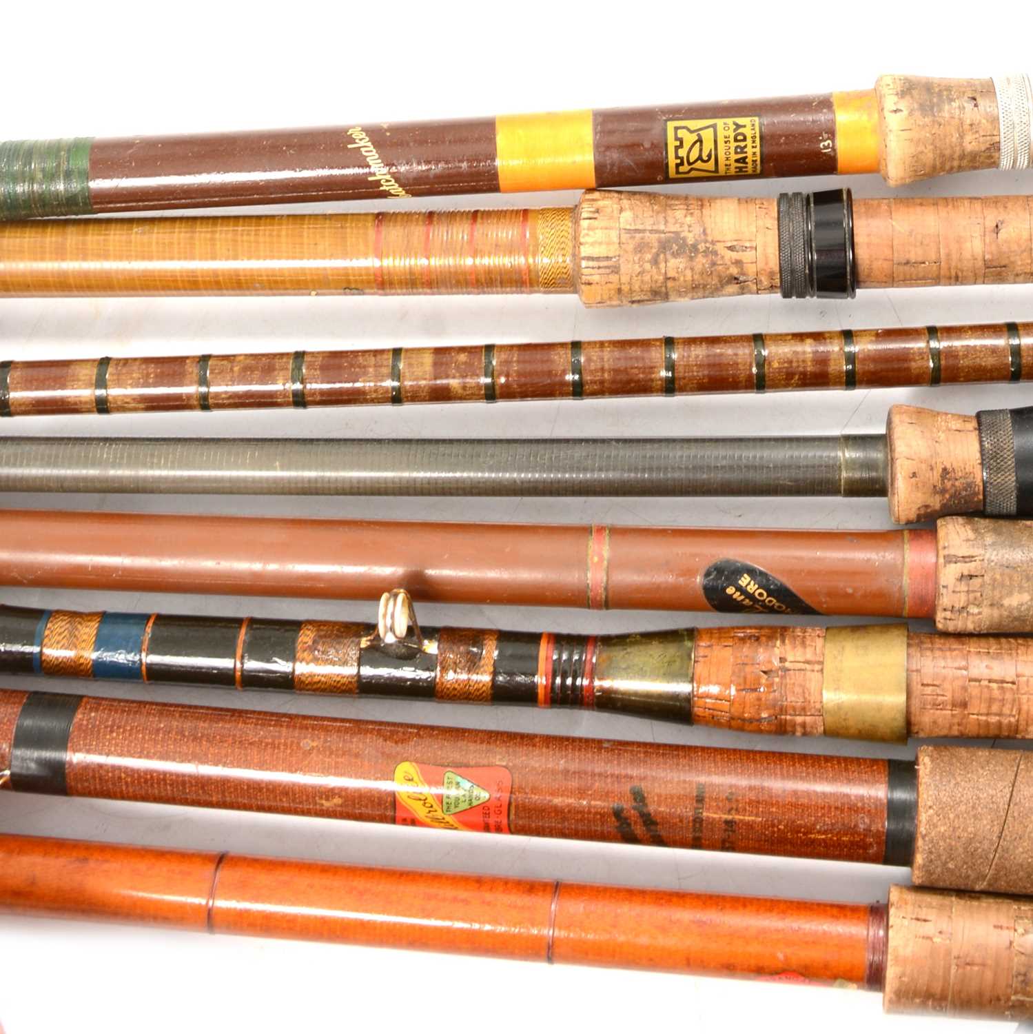 Lot 232 - Eight assorted carbon fibre fishing rods