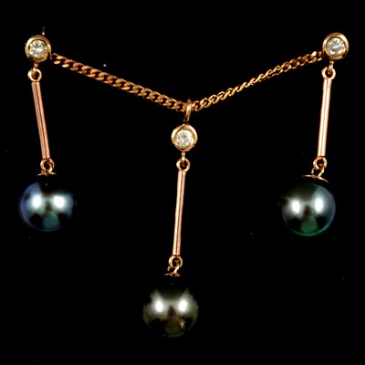 Lot 92 - South Sea pearl and diamond pendant and matching earring suite.