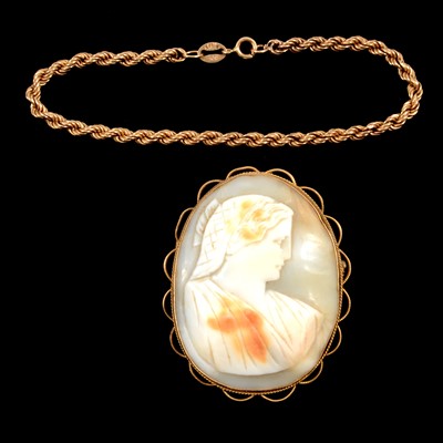 Lot 128 - A 9 carat yellow gold bracelet and a shell cameo brooch.