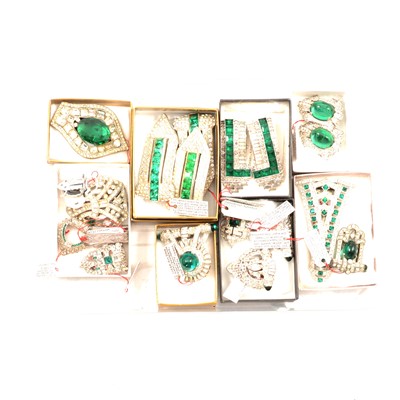 Lot 275 - Nineteen Art Deco and later faux emerald and diamond costume  jewellery dress clips.