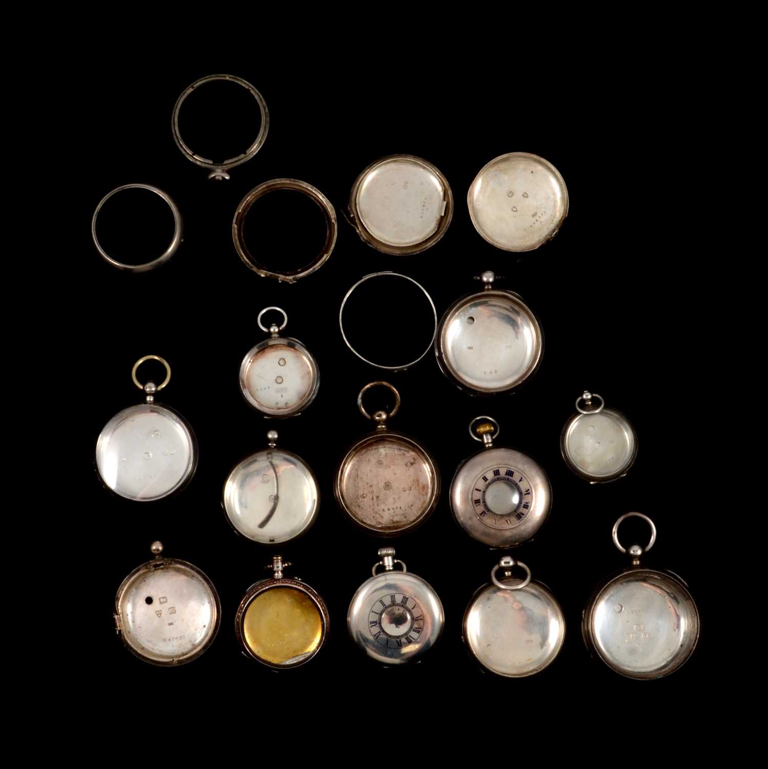 Lot 155 - Twelve silver and white metal pocket watch cases and other case parts.