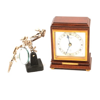 Lot 208 - A collection of pocket watch parts and an Elliott mantel clock.